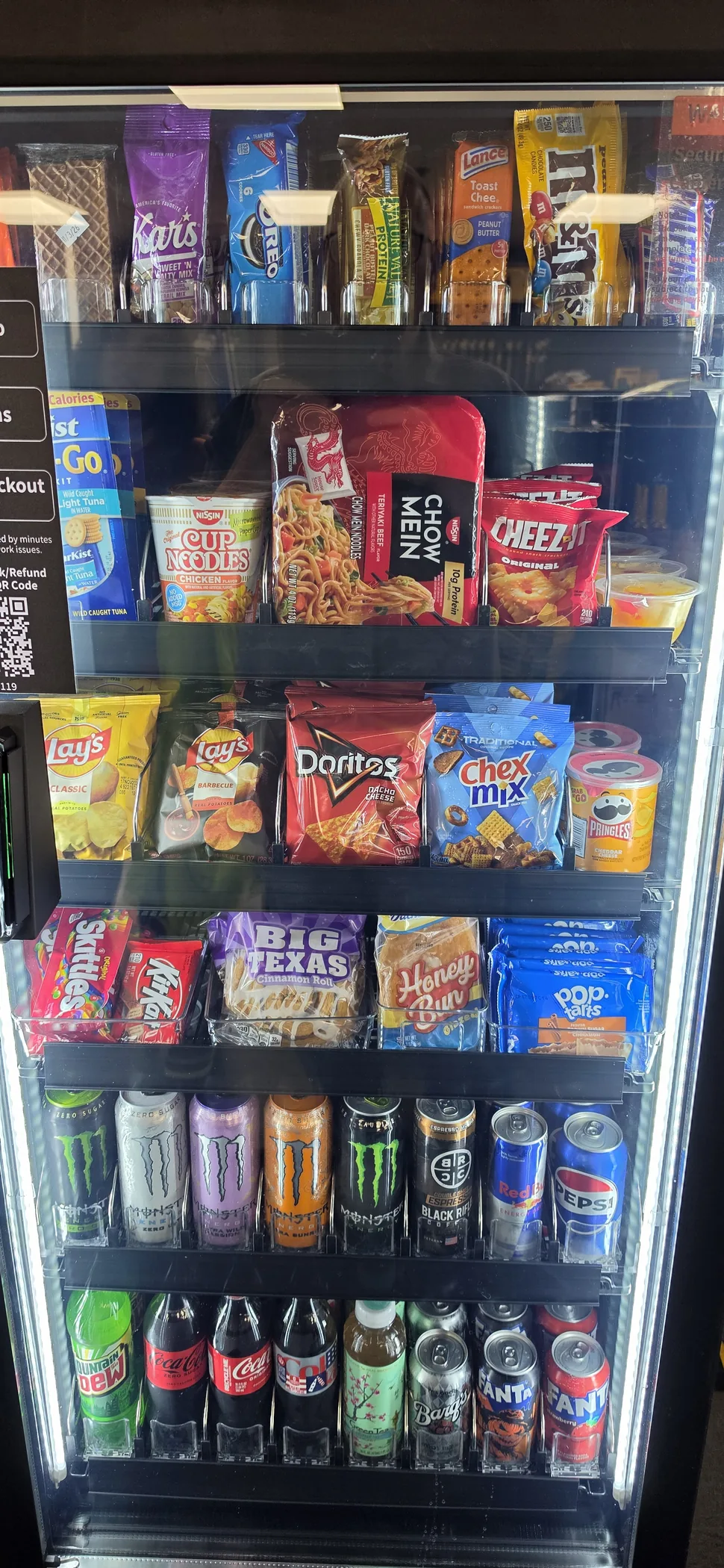 Close view of snack and beverage variety inside the smart cooler